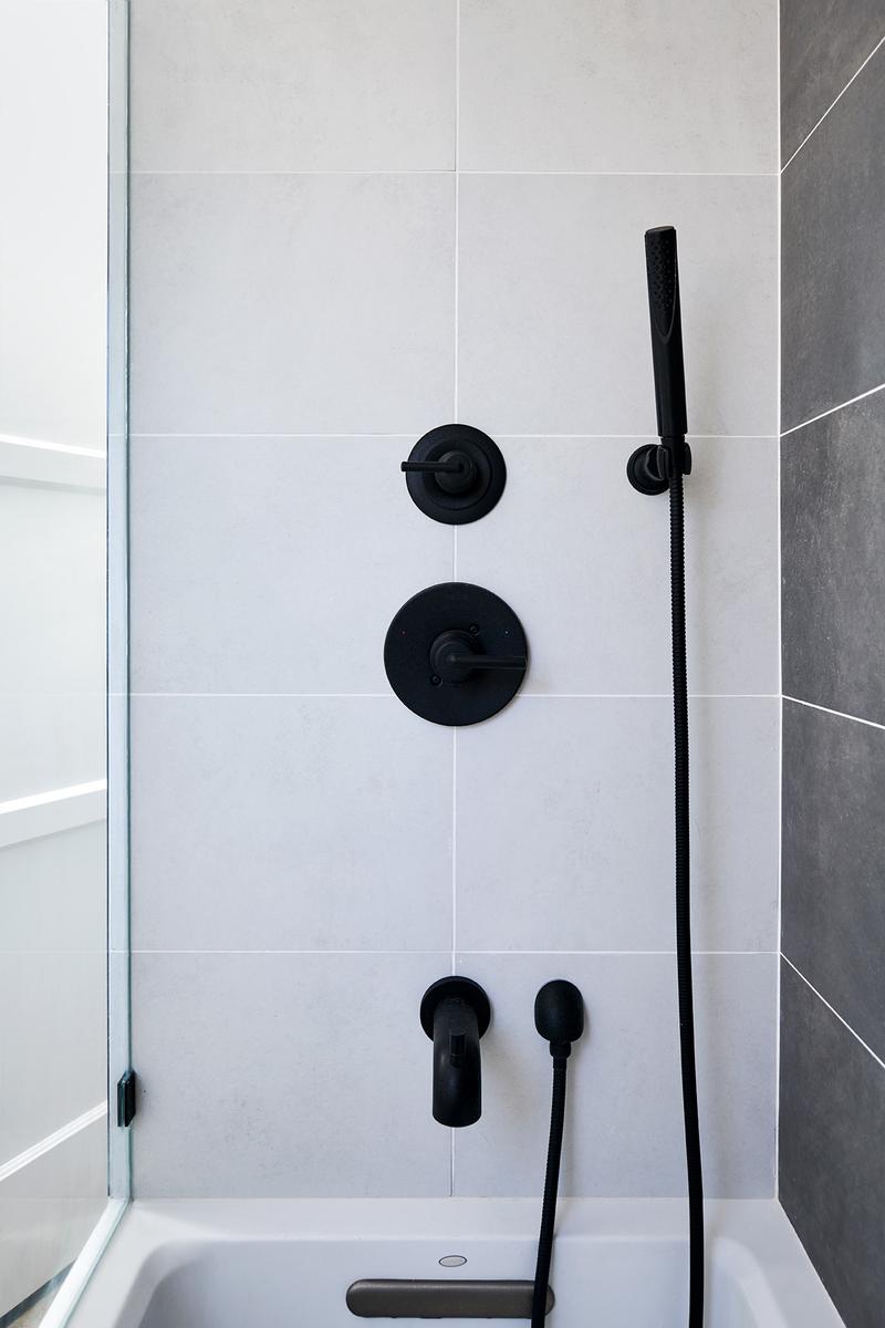 Guest Bathroom With Simple, Sleek Appliances