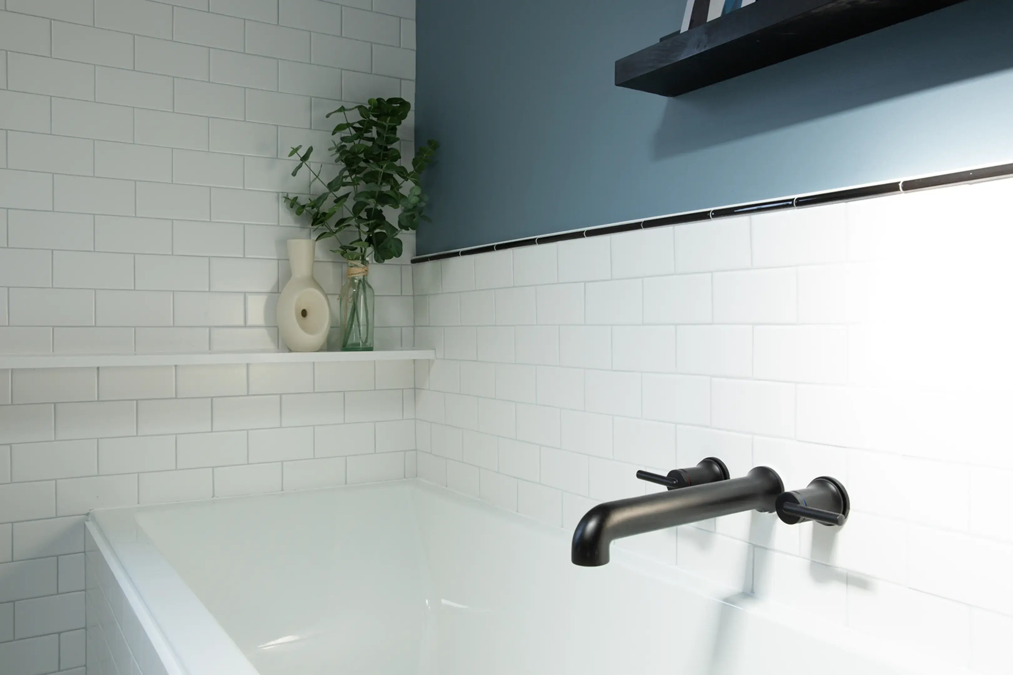 Blue walls with black and white tile
