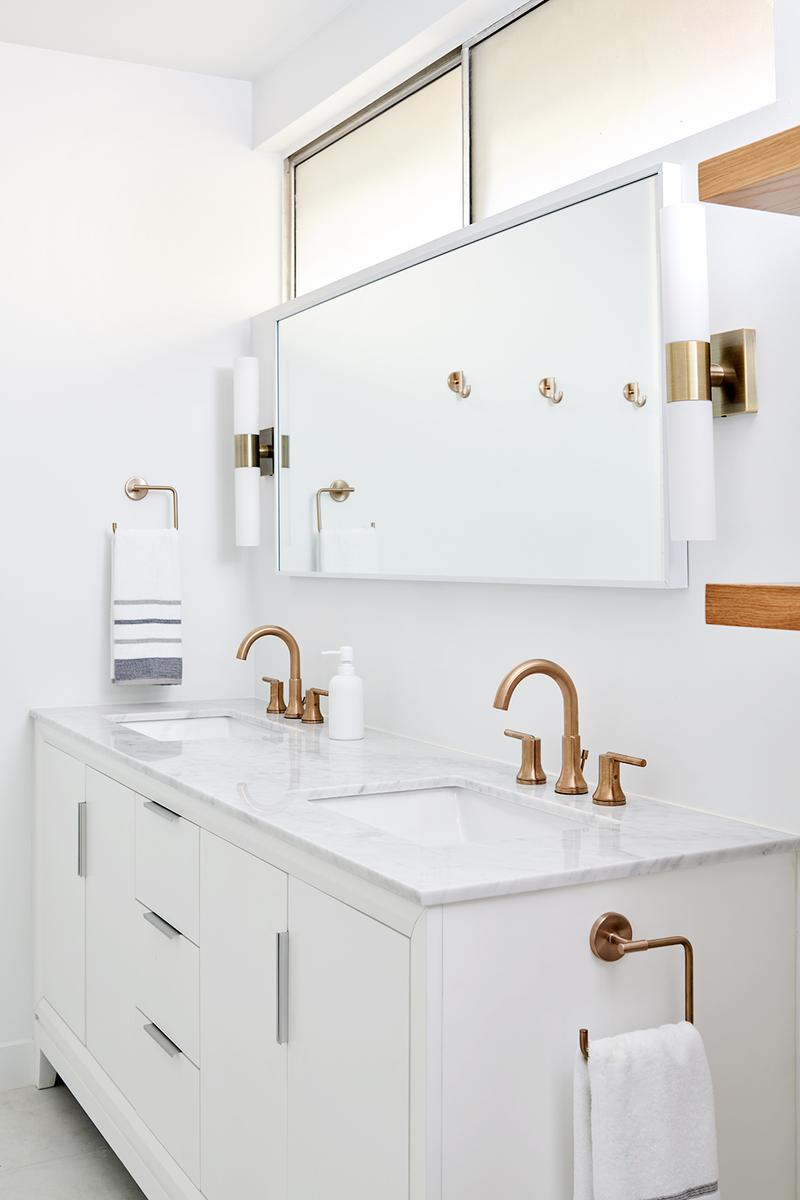 White Bathroom With Brassy Fixtures