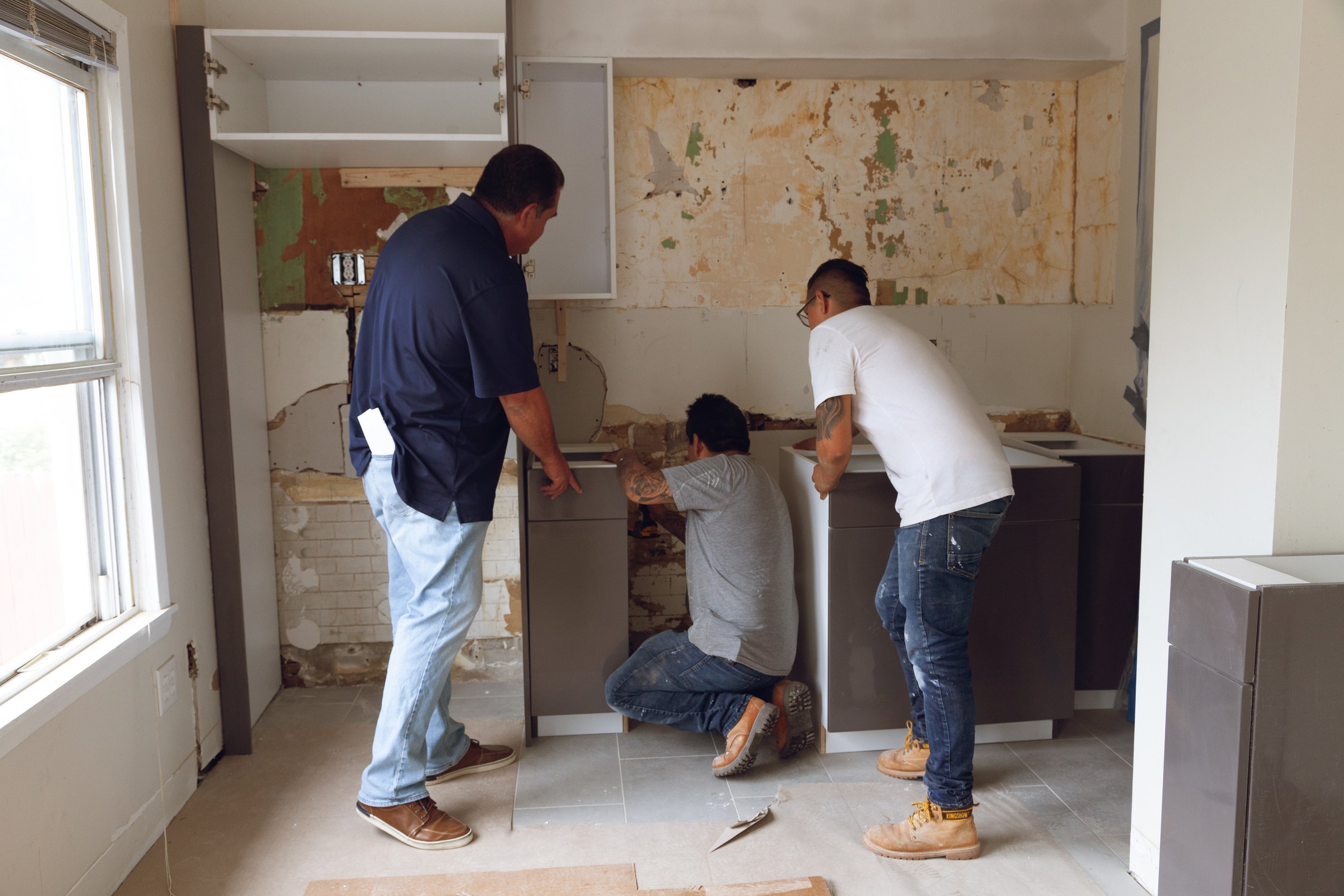 Contractors working on a kitchen remodel