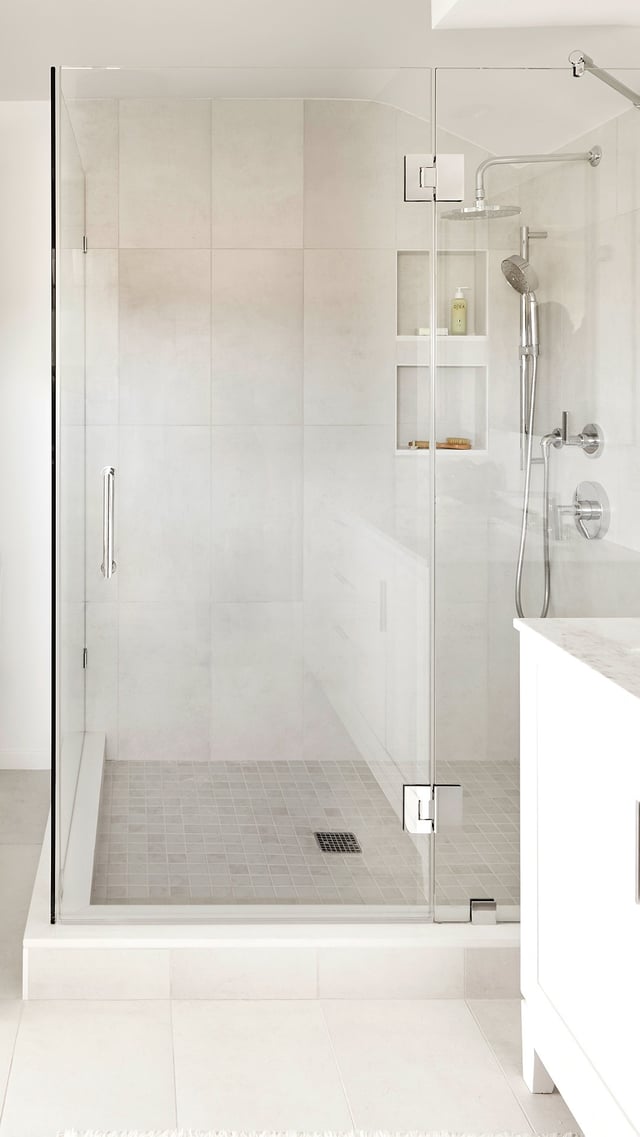 a shower with frameless doors