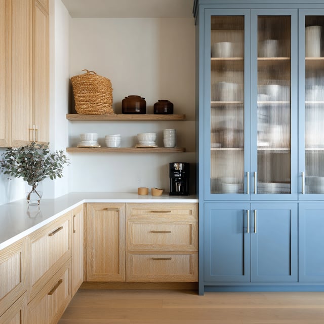 A minimalist kitchen with identical shaker cabinets
