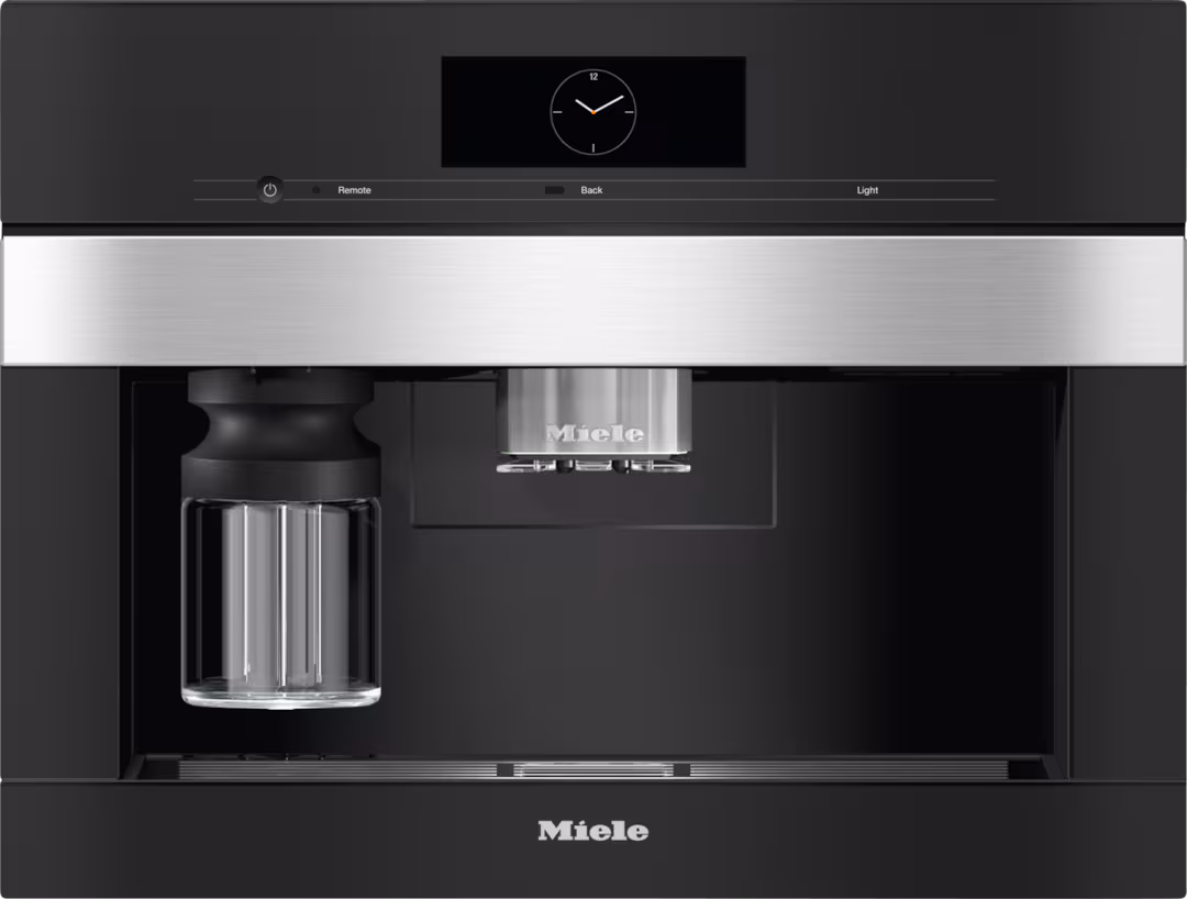 Sleek Miele built-in coffee system with a digital clock.