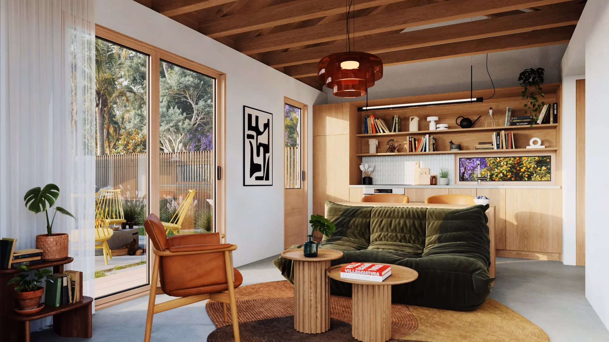 A warm, mid-century modern living space and kitchen featuring exposed wooden ceiling beams, a plush olive green sofa, and large sliding glass doors that open to a lush garden.