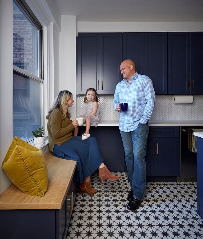 Familty enjoying coffee in their newly renovated modern ktchen